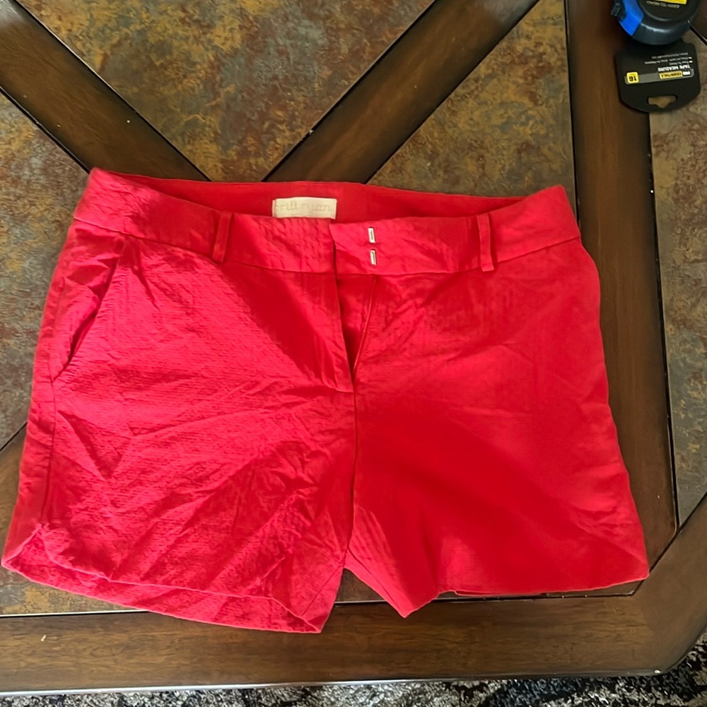Ladies size 10 red shorts. EUC. Textured, zip front, belt loops and pockets